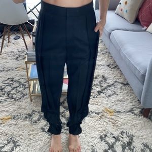 Dressy high waisted trousers.